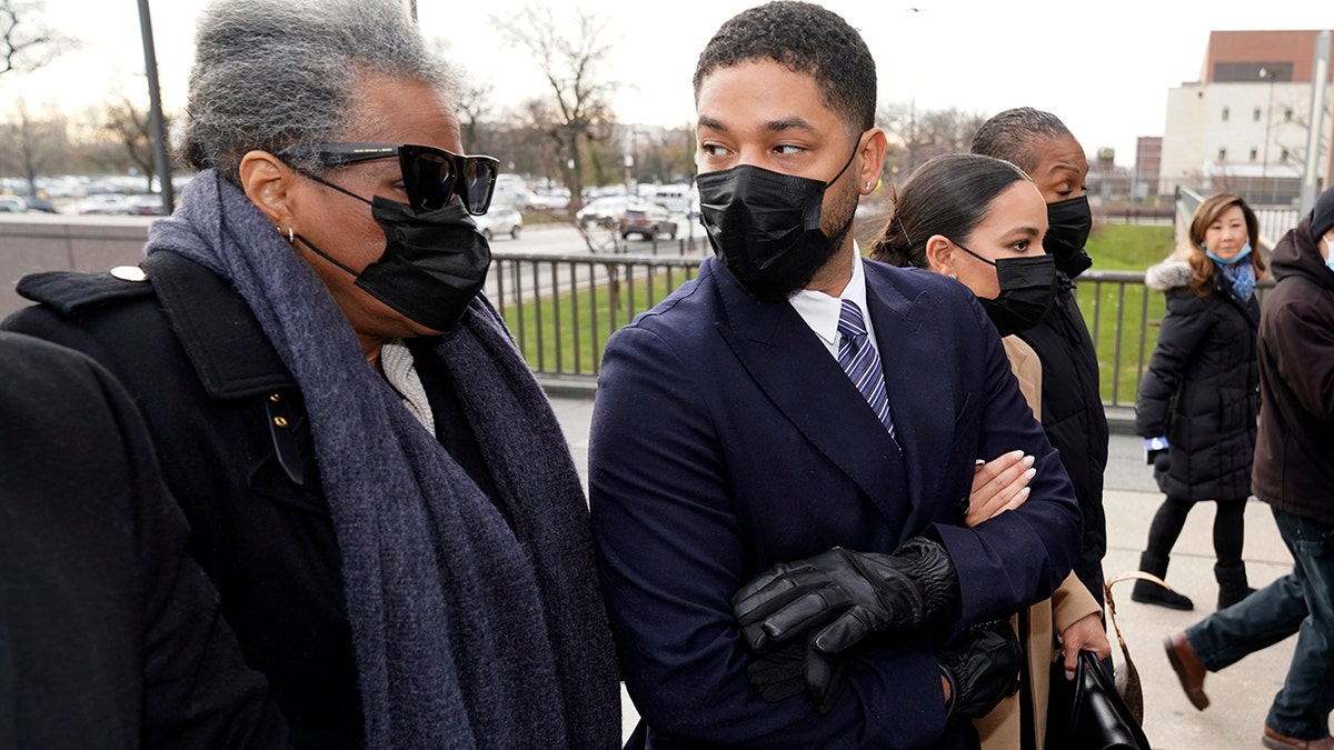 Jussie Smollett and his mother arrive at Leighton Criminal Courthouse for jury selection at his trial in Chicago.
