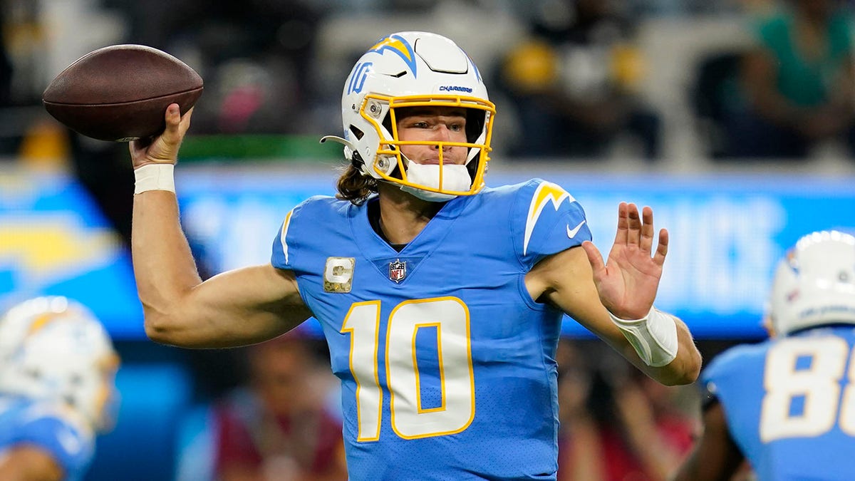 Los Angeles Chargers quarterback Justin Herbert throws a pass during the first half of an NFL football game against the Pittsburgh Steelers, Sunday, Nov. 21, 2021, in Inglewood, California.