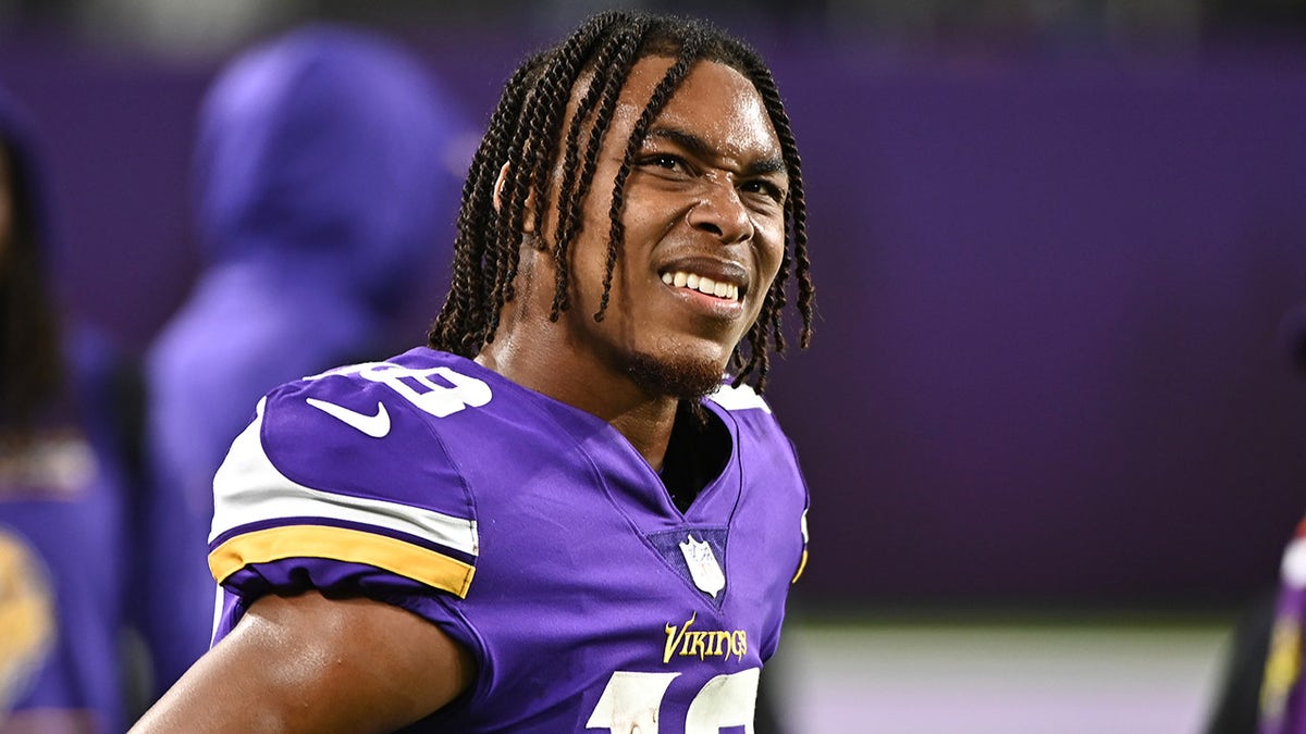 MINNEAPOLIS, MINNESOTA - OCTOBER 31: Justin Jefferson #18 of the Minnesota Vikings looks on against the Dallas Cowboys during the second half at U.S. Bank Stadium on October 31, 2021 in Minneapolis, Minnesota.