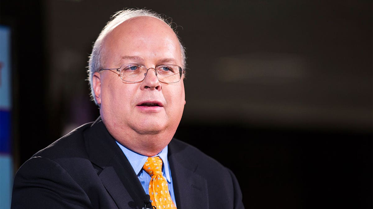 Karl Rove speaks at an event.