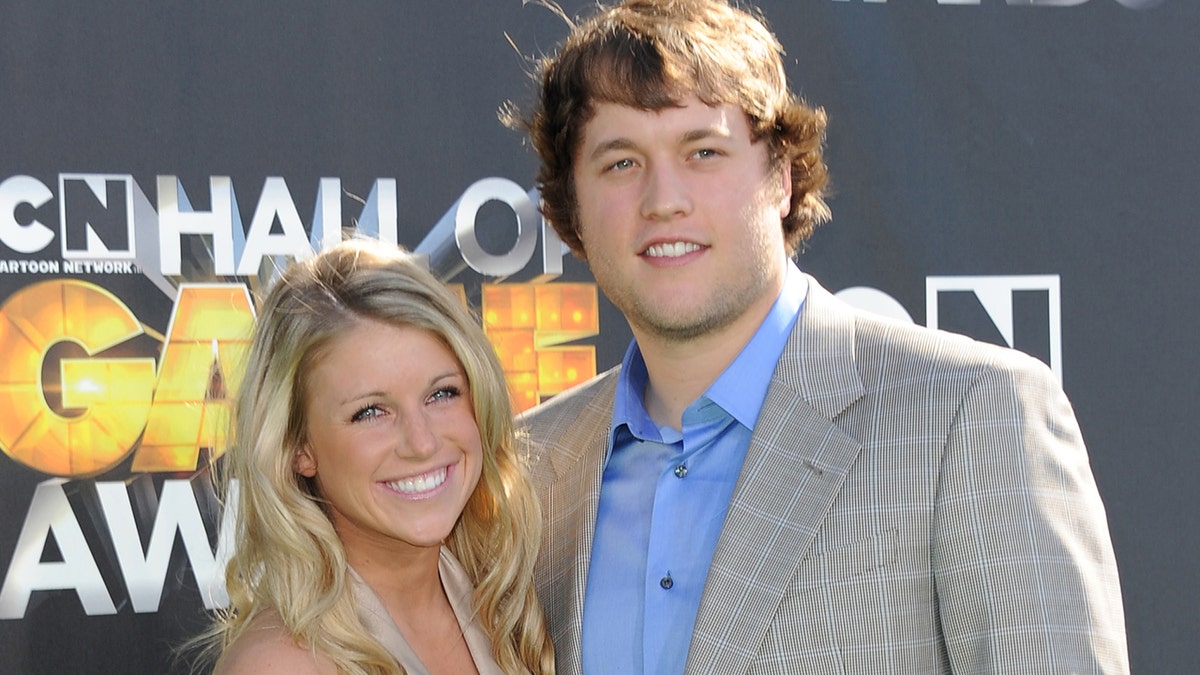 Detroit Lions quarterback Matthew Stafford and Kelly Hall arrives at Cartoon Network Hall of Game Awards held at The Barker Hanger on February 21, 2011 in Santa Monica, California.
