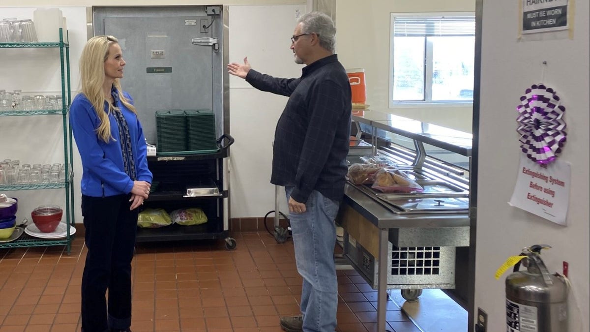 Republican Senate candidate Kelly Tshibaka tours Fairbanks Rescue Mission with CEO Pete Kelly in Fairbanks, Alaska, in October 2021.