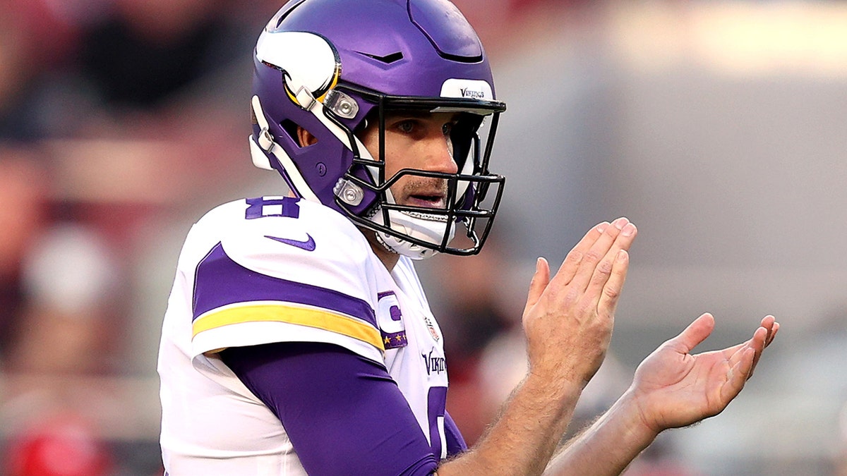 Kirk Cousins of the Minnesota Vikings reacts after a rushing touchdown by teammate Alexander Mattison (not in photo) in the third quarter against the San Francisco 49ers at Levi's Stadium Nov. 28, 2021 in Santa Clara, Calif.