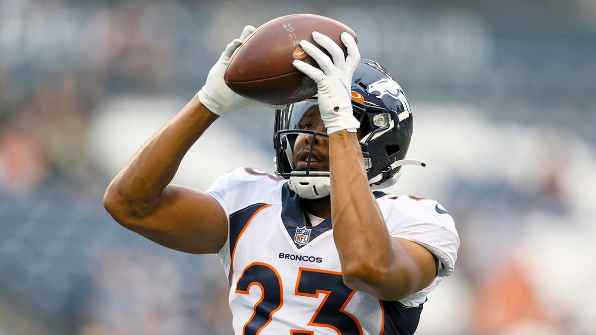 SEATTLE, WASHINGTON - AUGUST 21: Cornerback Kyle Fuller #23 of the Denver Broncos warms up before an NFL preseason game against the Seattle Seahawks at Lumen Field on August 21, 2021 in Seattle, Washington. The Denver Broncos beat the Seattle Seahawks 30-3. 