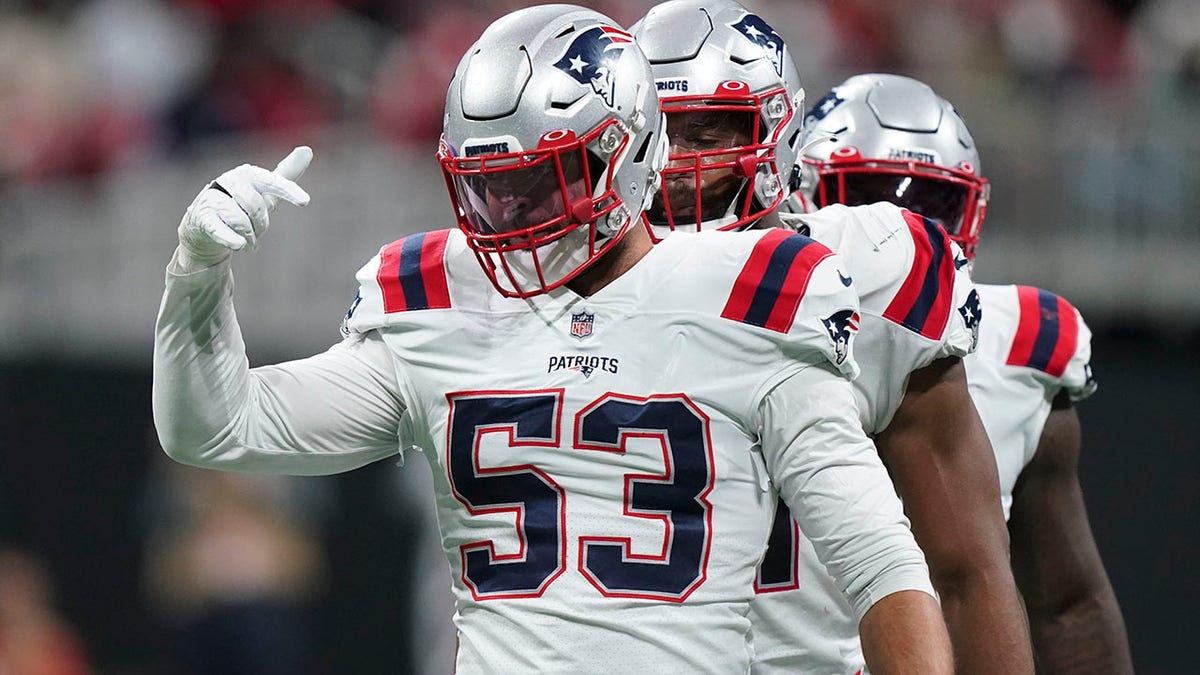 New England Patriots middle linebacker Kyle Van Noy (53) celebrates tackling Atlanta Falcons quarterback Matt Ryan during the first half of an NFL football game, Thursday, Nov. 18, 2021, in Atlanta.