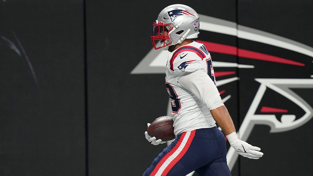 New England Patriots middle linebacker Kyle Van Noy (53) runs into the end zone after an interception for a touchdown against the Atlanta Falcons during the second half of an NFL football game, Thursday, Nov. 18, 2021, in Atlanta. The New England Patriots won 25-0.