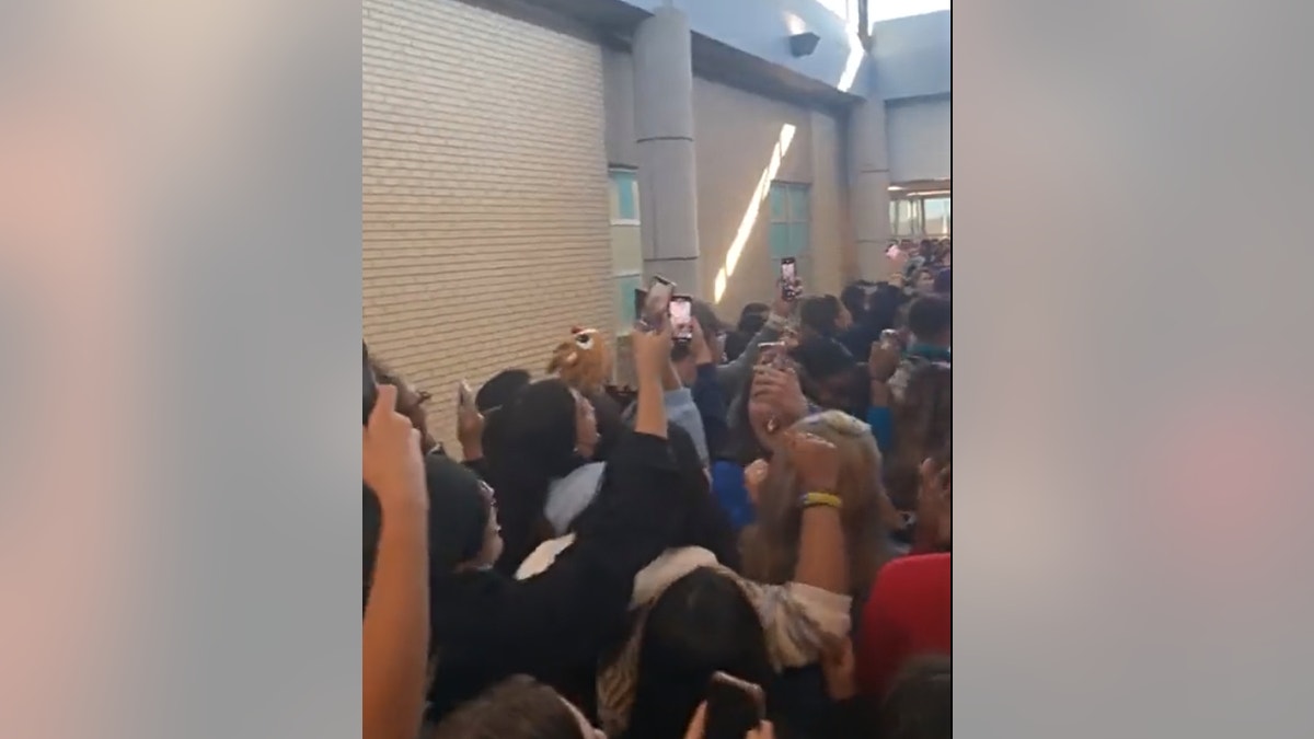 Four students from Little Elm High School in Texas after a walkout protest turned chaotic, according to the school district. (Source: Little Elm student)