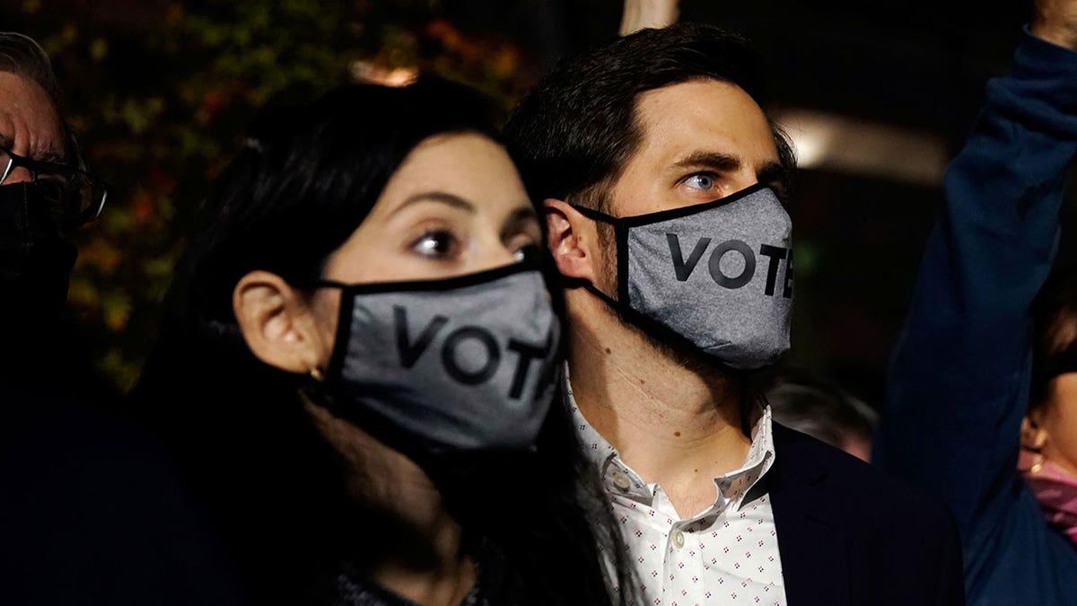 MASKED-VOTERS-TERRY-MCAULIFFE-VIRGINIA-RALLY