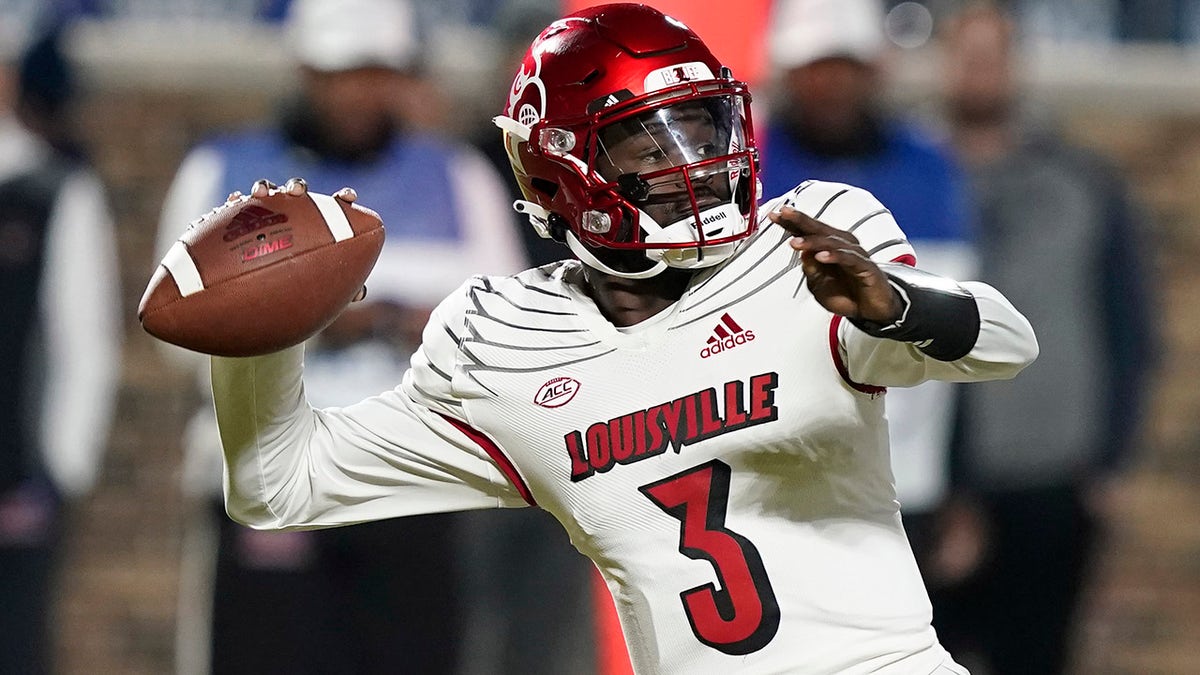 Louisville quarterback Malik Cunningham (3) looks to pass against Duke during the first half of an NCAA college football game in Durham, N.C., Thursday, Nov. 18, 2021.