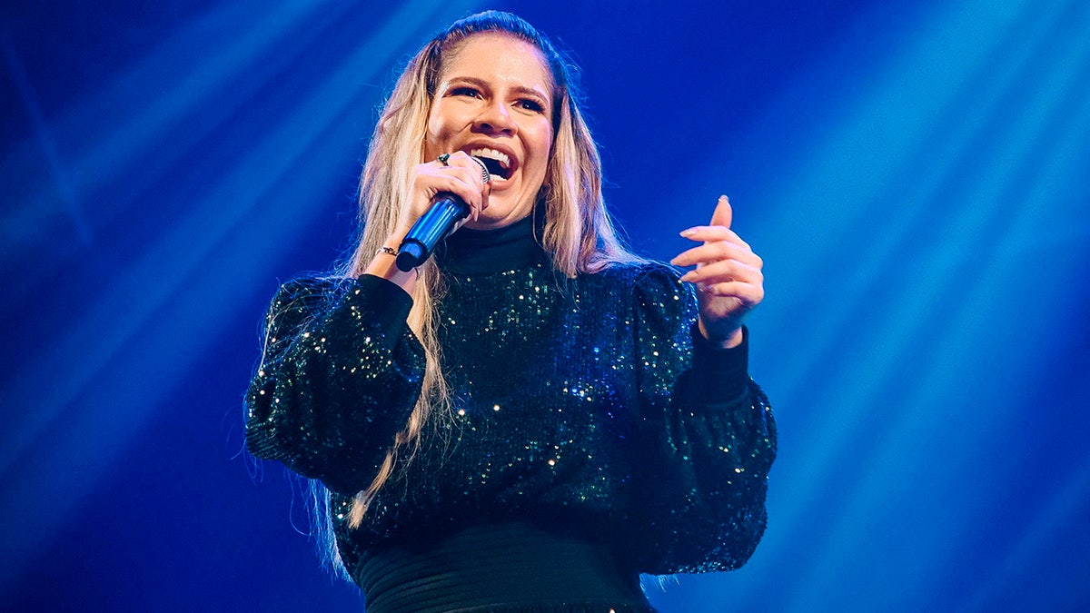 Singer Marília Mendonça performs in Sao Jose dos Campos, Brazil, Saturday, Sept. 25, 2021. One of Brazil’s most popular singers and a Latin Grammy winner, Mendonca died on Friday, Nov. 5, 2021, in an airplane crash on her way to a concert. Mendonça was 26 and performed country music in Brazil called sertanejo.