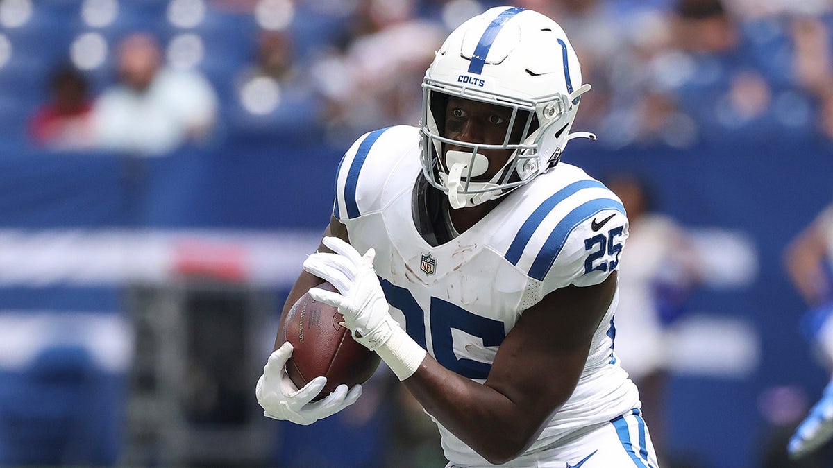 INDIANAPOLIS, INDIANA - AUGUST 15: Marlon Mack #25 of the Indianapolis Colts runs the ball in the preseason game against the Carolina Panthers at Lucas Oil Stadium on August 15, 2021 in Indianapolis, Indiana.