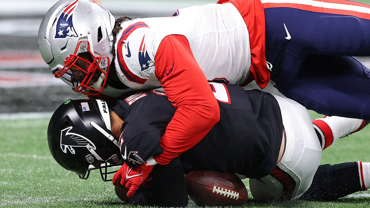 Matt Ryan of the Atlanta Falcons is sacked by Matt Judon of the New England Patriots in the second quarter at Mercedes-Benz Stadium on Nov. 18, 2021, in Atlanta, Georgia.?