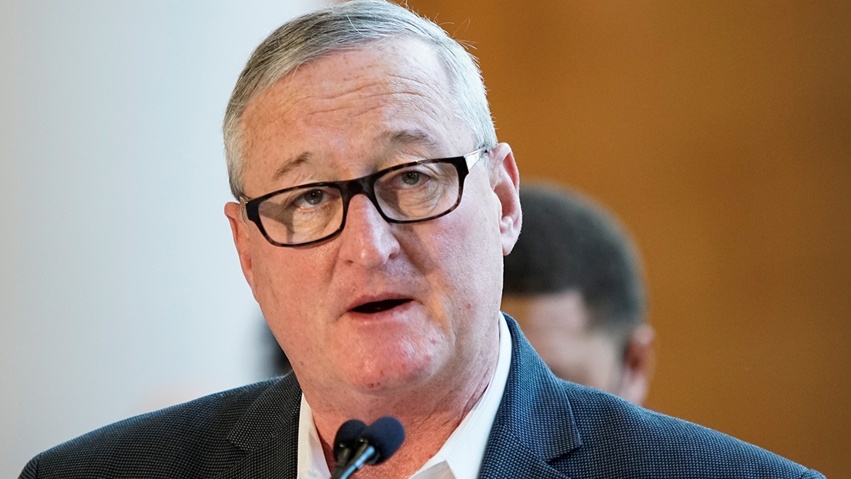 Philadelphia Mayor Jim Kenney seen speaking a microphone