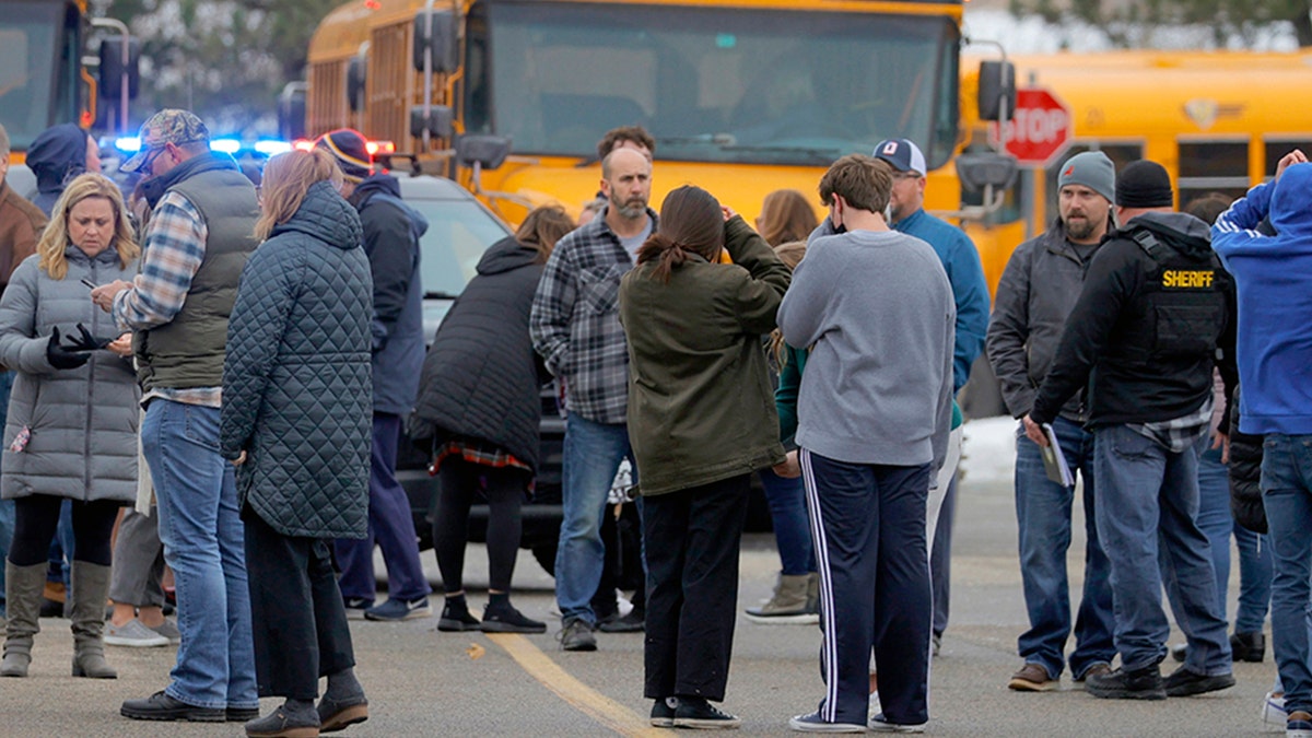 Students' parents outside of Oxford, Michigan school