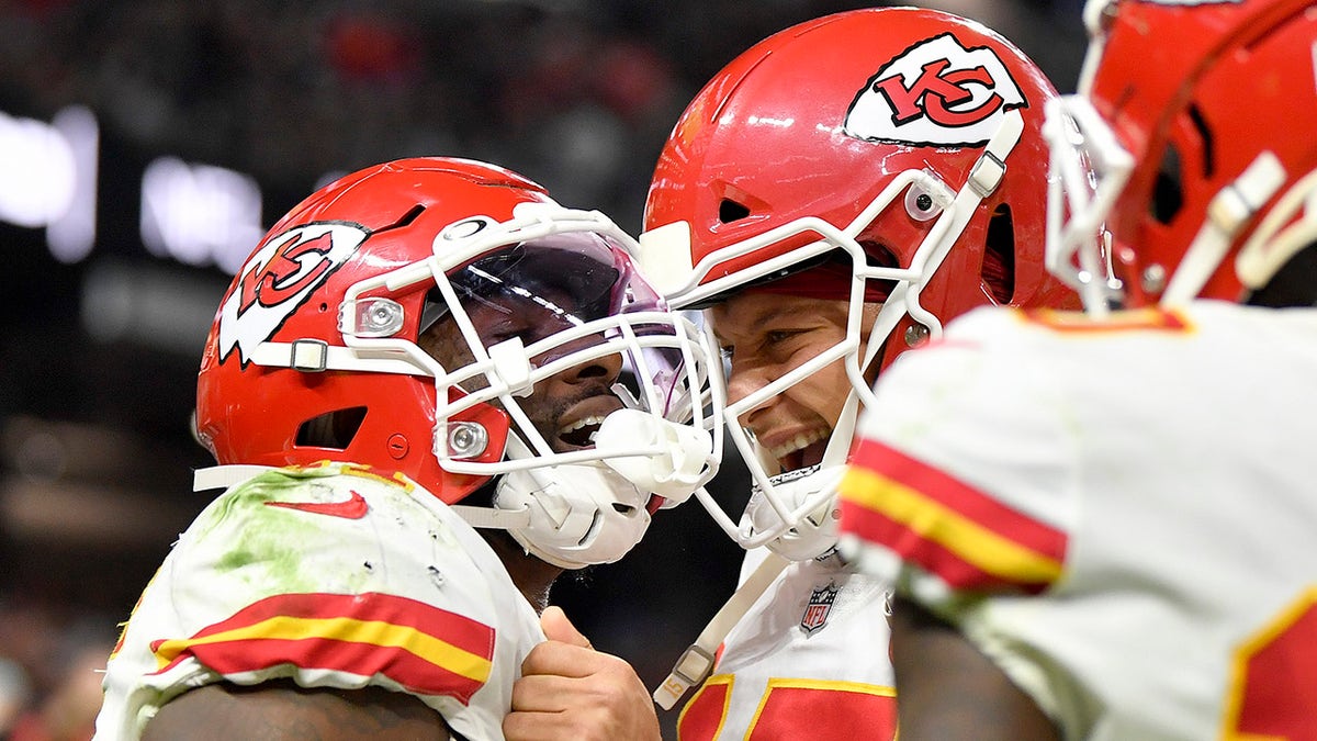 Darrel Williams celebrates with his Kansas City Chiefs teammate Patrick Mahomes after scoring a touchdown against the Raiders on Nov.14, 2021, in Las Vegas, Nevada.