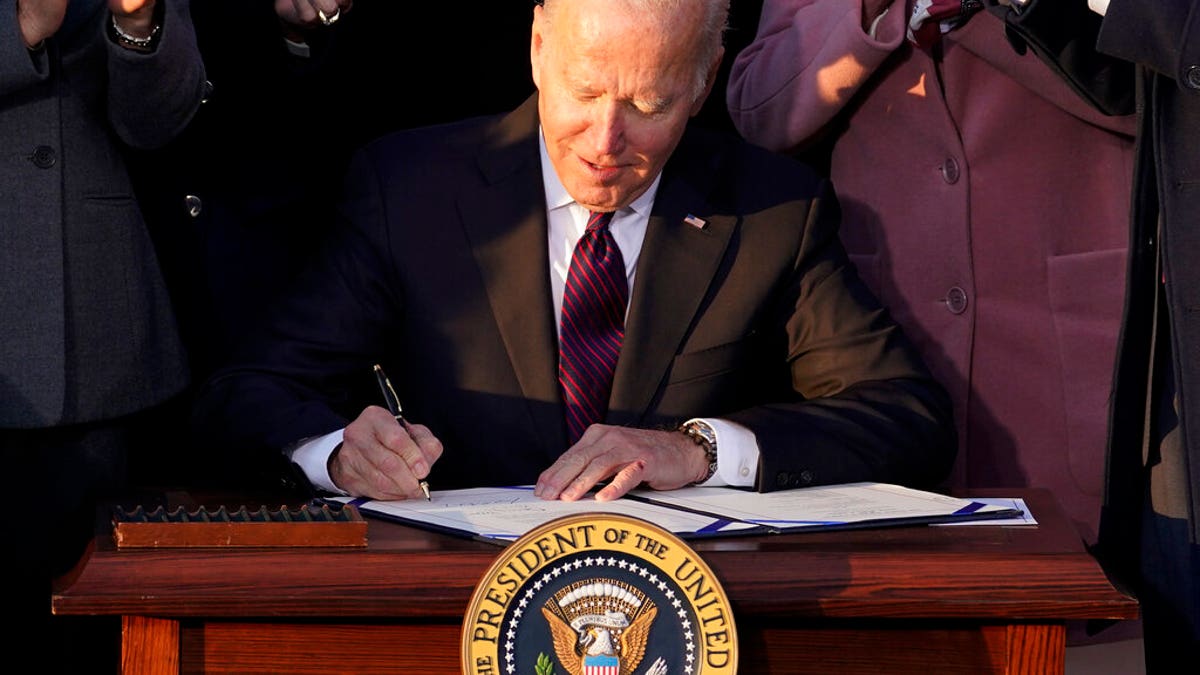 President Biden signs the infrastructure bill into law