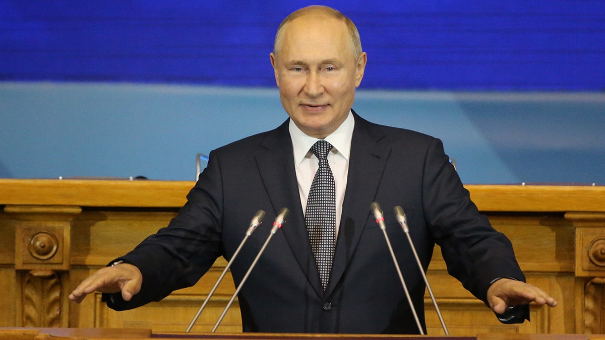 Russian President Vladimir Putin speaks during the 3rd Eurasian Women's Forum (EAFW) plenary meeting on Oct. 14 in Saint Petersburg, Russia. Recently, Putin spoke about building up the country's defense amid NATO's military activities near Russia's borders.