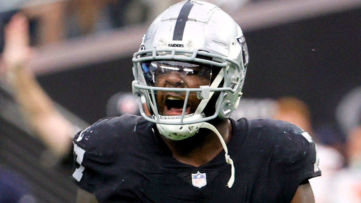 Las Vegas Raiders defensive end Maxx Crosby (98) looks dejected