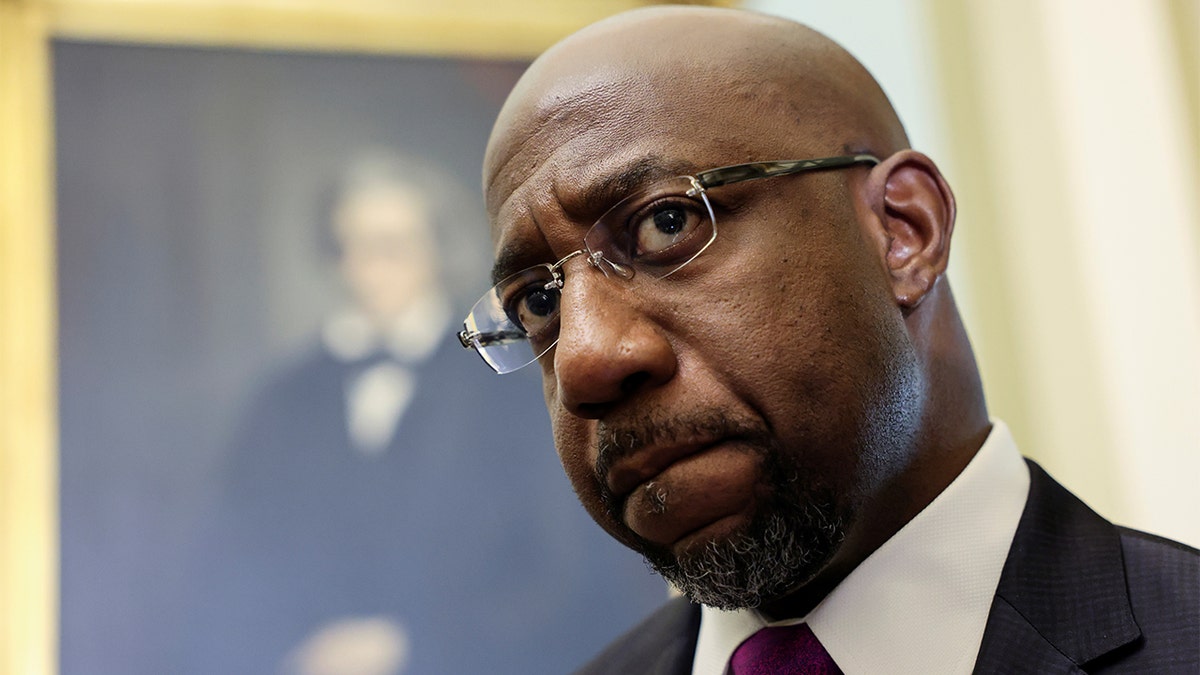 Sen. Raphael Warnock, D-Ga., arrives for the Senate Democrats weekly policy lunch at the U.S. Capitol in Washington, June 15, 2021.