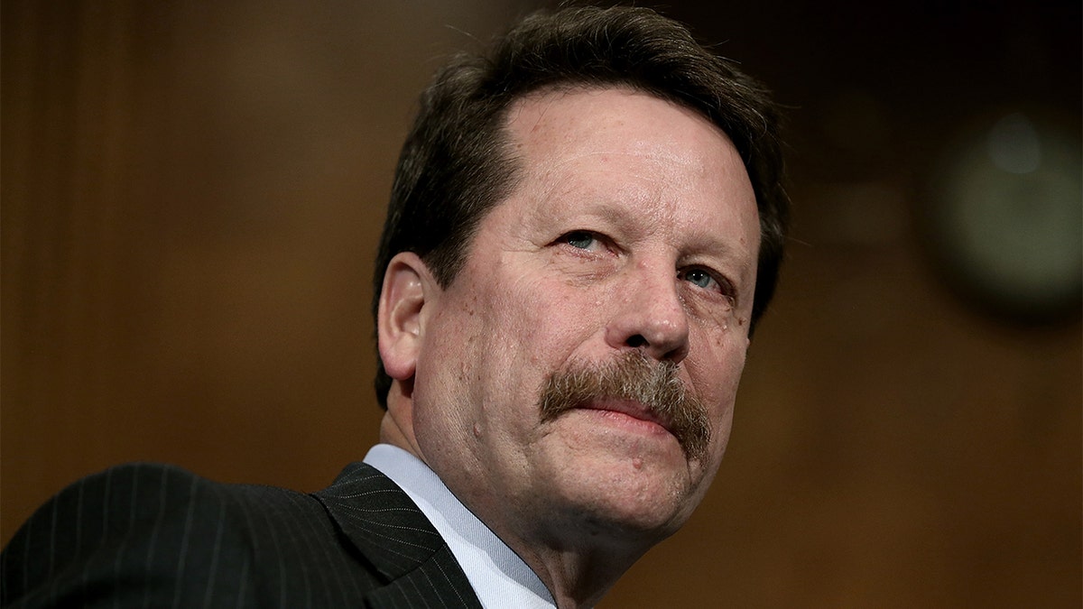 FILE - Dr. Robert Califf awaits the start of his nomination hearing before the Senate Health, Education, Labor and Pensions Committee November 17, 2015, in Washington, D.C. 