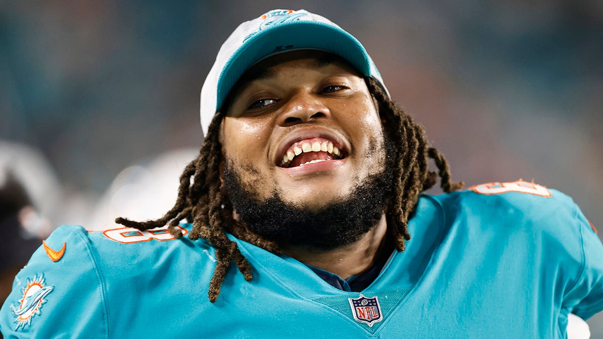 MIAMI GARDENS, FLORIDA - AUGUST 21: Robert Hunt #68 of the Miami Dolphins laughs against the Atlanta Falcons during a preseason game at Hard Rock Stadium on August 21, 2021 in Miami Gardens, Florida.