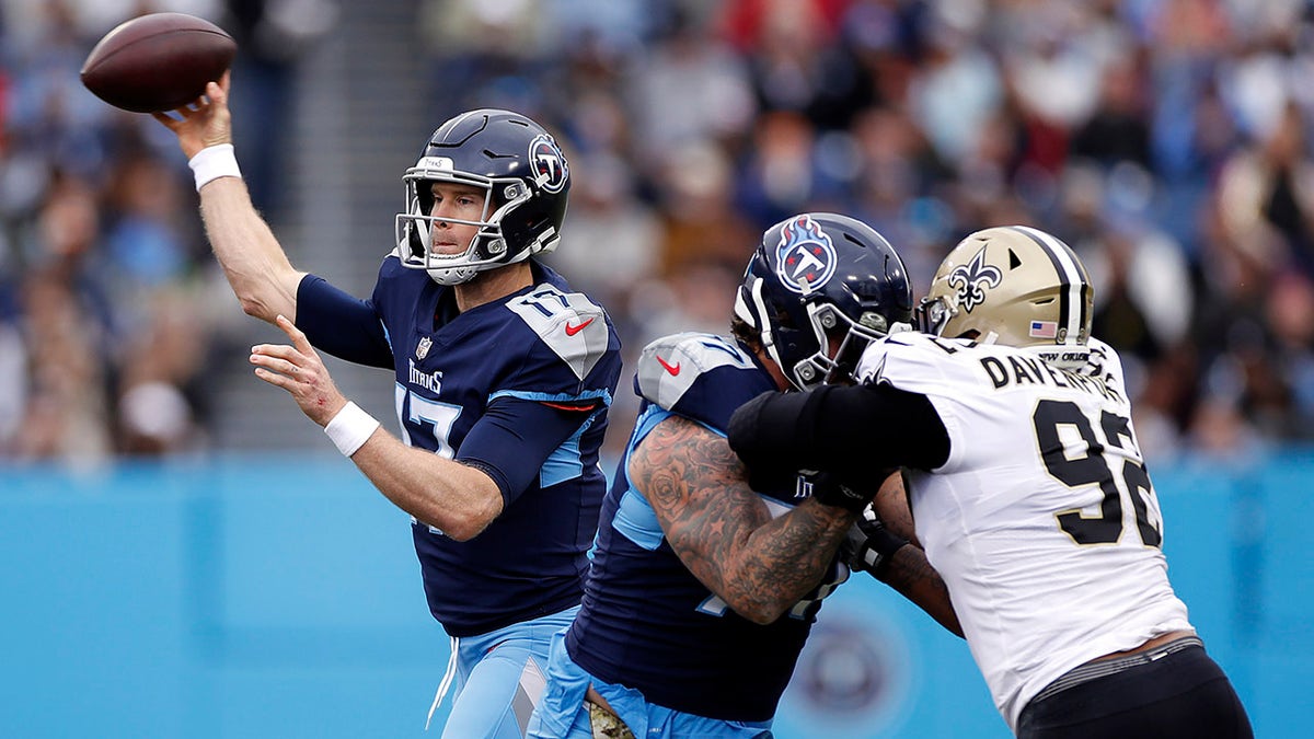 Ryan Tannehill of the Titans passes against the New Orleans Saints at Nissan Stadium on Nov. 14, 2021 in Nashville, Tennessee.