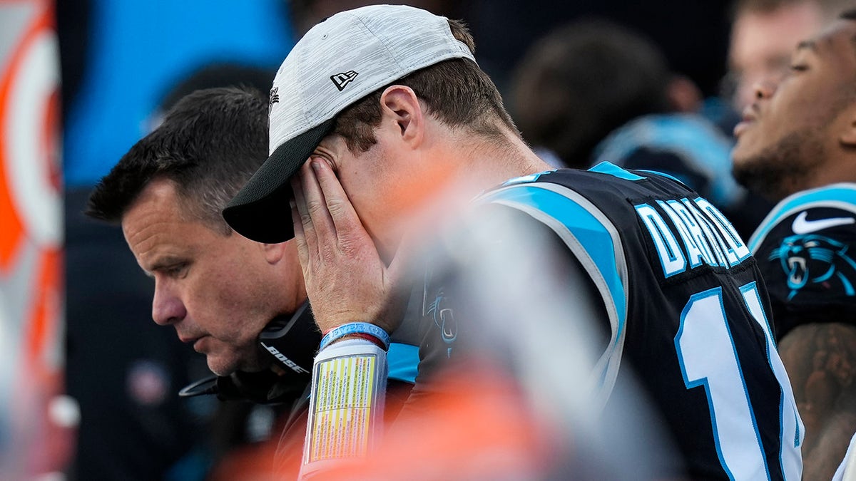 Carolina Panthers quarterback Sam Darnold (14) on the bench in the closing minutes after losing to the New England Patriots Nov. 7, 2021 at Bank of America Stadium.