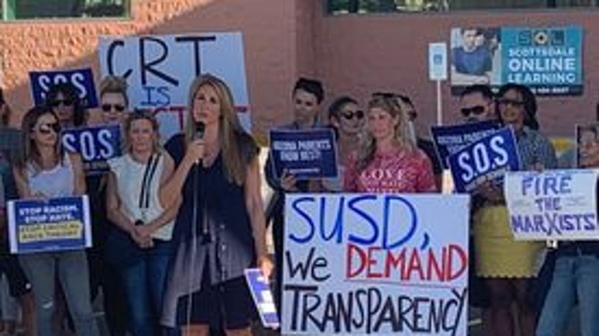 Parents protest at a Scottsdale, Arizona, school board meeting