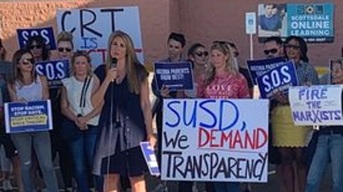 Parents protest at a Scottsdale, Arizona, school board meeting