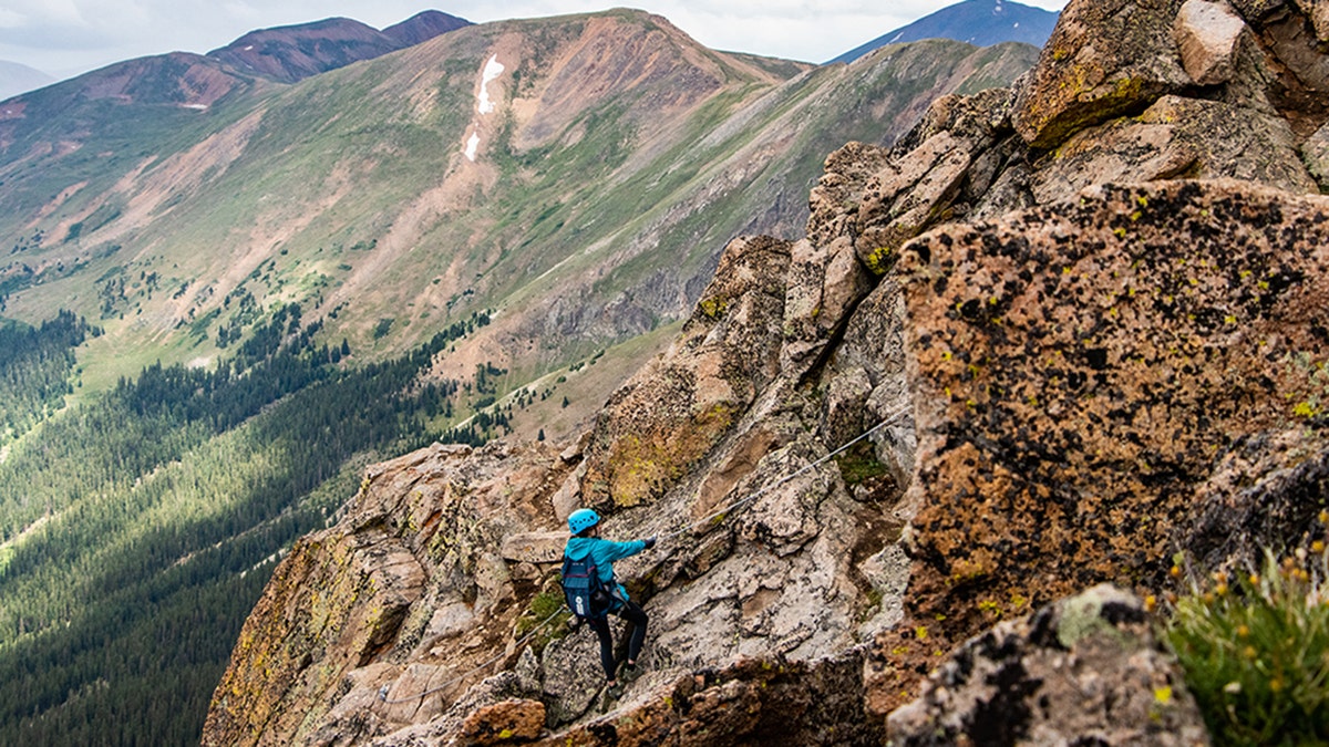 Guests enjoy the highest Via Ferrata in North America at Arapahoe Basin Ski Area, topping outat 12, 999 feet, located in Summit County, Colorado. July 2021.