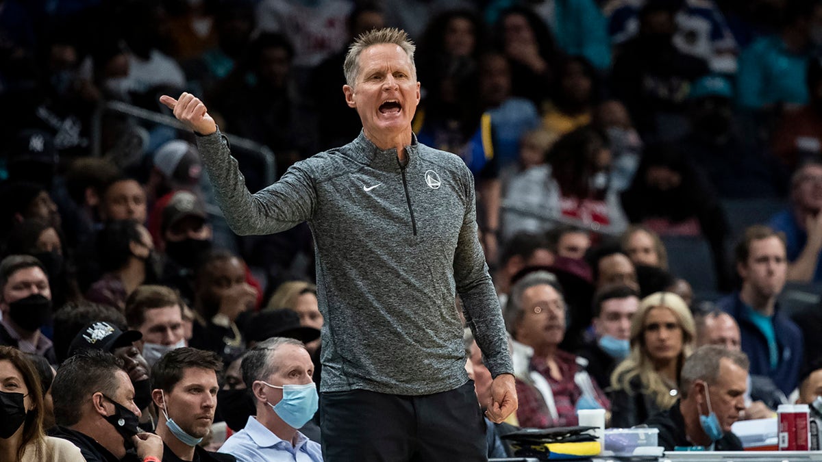 Golden State Warriors head coach Steve Kerr reacts during the first half of an NBA basketball game against the Charlotte Hornets, Sunday, Nov. 14, 2021, in Charlotte, North Carolina.