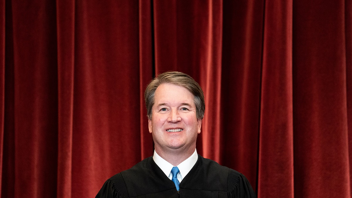 Justice Brett Kavanaugh, at the Supreme Court's group photo session in Washington on April 23, had previously agreed with the decision not to take up a particular appeal about New York gun regulations.