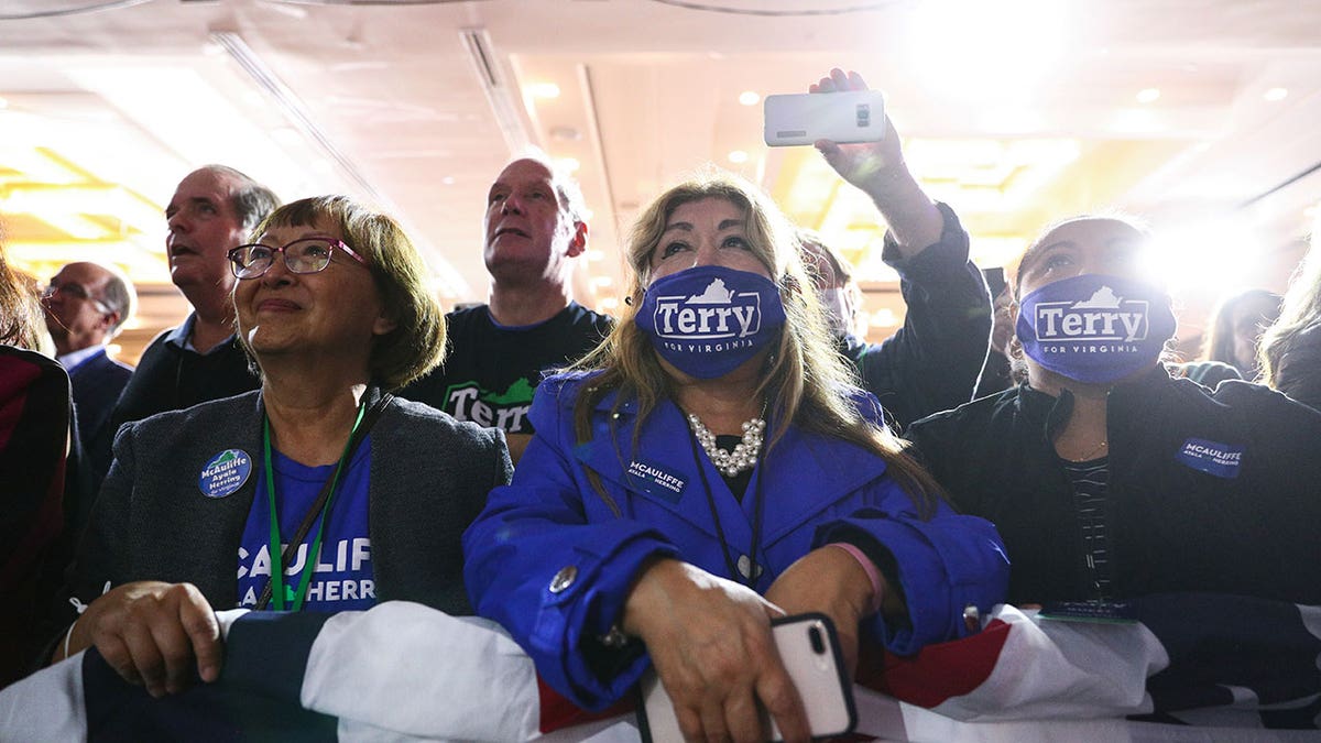 TERRY-MCAULIFFE-SUPPORTERS-MASKED-PARTY