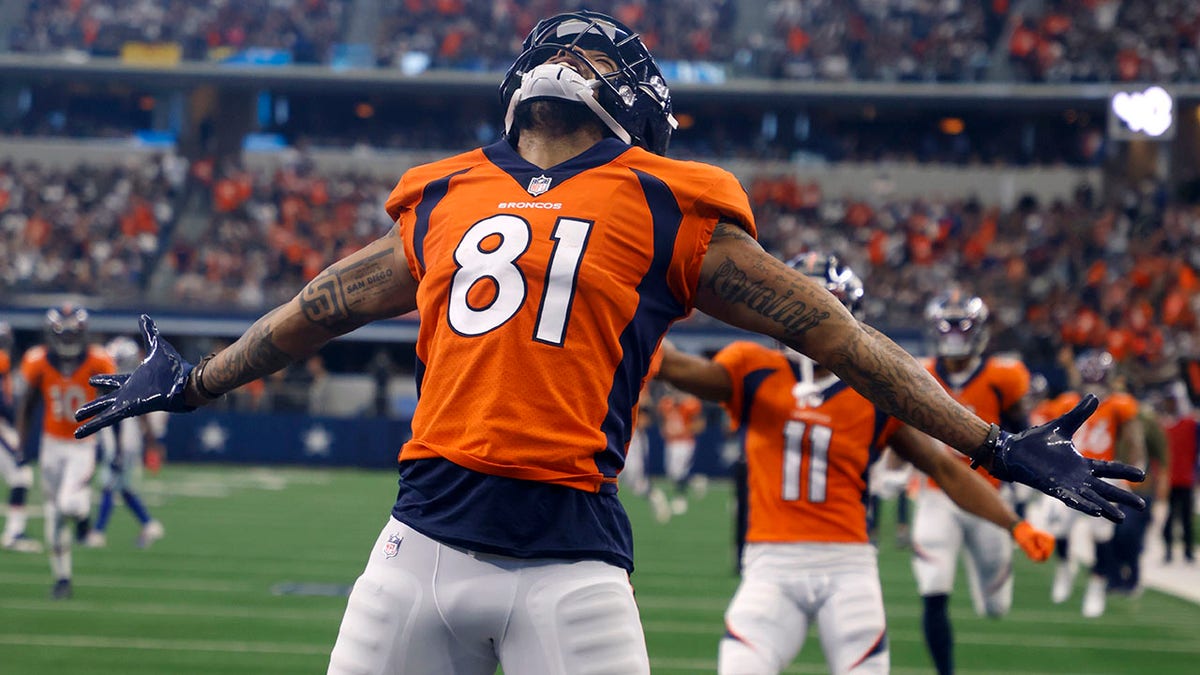 Denver Broncos wide receiver Tim Patrick celebrates catching a touchdown pass against the Dallas Cowboys in Arlington, Texas, Nov. 7, 2021.