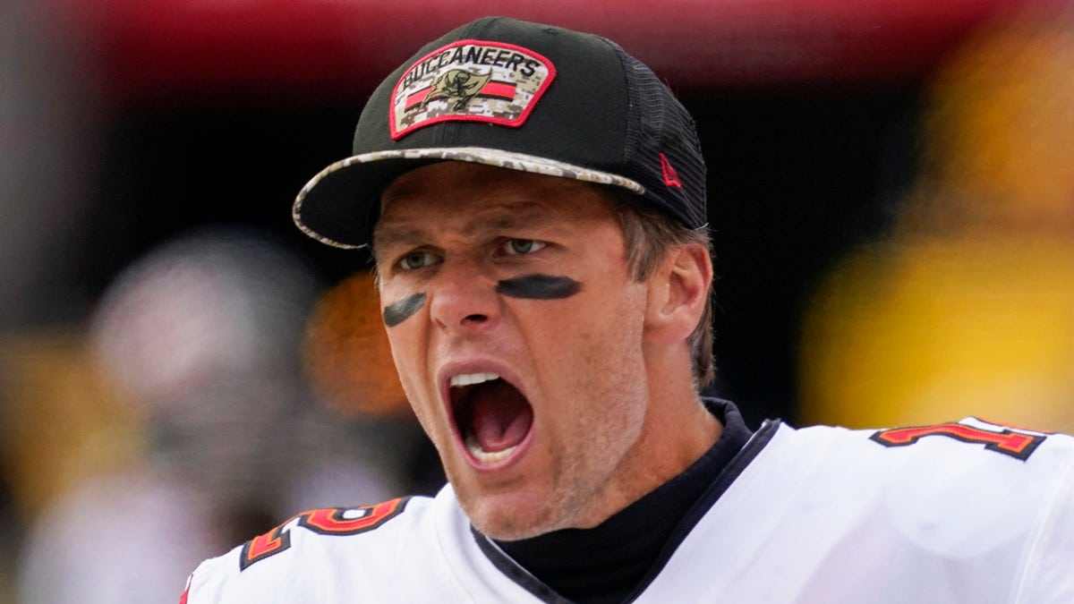 Tampa Bay Buccaneers quarterback Tom Brady yells at his team during the second half of an NFL football game against the Washington Football Team, Sunday, Nov. 14, 2021, in Landover, Maryland.