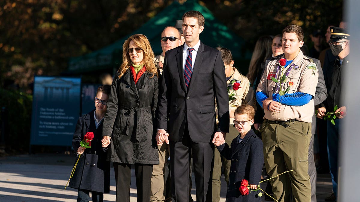 Sen. Tom Cotton (R-AR), and his family, stand before placing flowers during a centennial commemoration event at the Tomb of the Unknown Soldier in Arlington National Cemetery on November 9, 2021, in Arlington, Virginia. (Photo by Alex Brandon-Pool/Getty Images)
