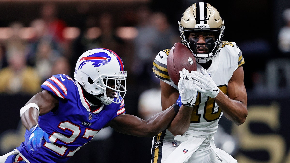 Buffalo Bills cornerback Tre'Davious White (27) defends a pass against New Orleans Saints wide receiver Tre'Quan Smith (10) in the first half of an NFL football game in New Orleans, Thursday, Nov. 25, 2021.