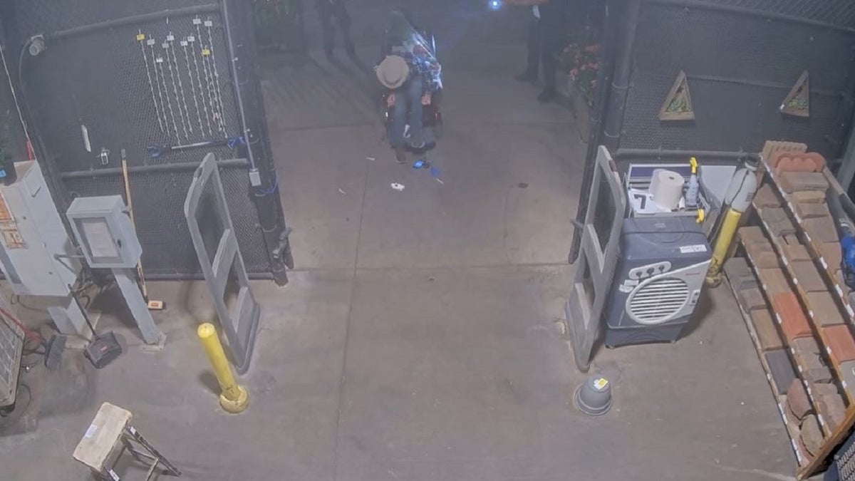 Lowe's security footage shows Richards in his wheelchair before he was shot. 