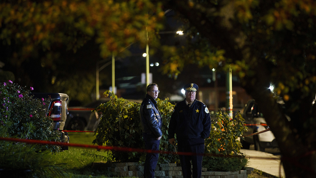 Police work at the scene where a 44-year-old off-duty Chicago police officer was fatally shot on the 8500 block of W. Winona Street in the in the Oriole Park neighborhood of Chicago on Nov. 2, 2021. 