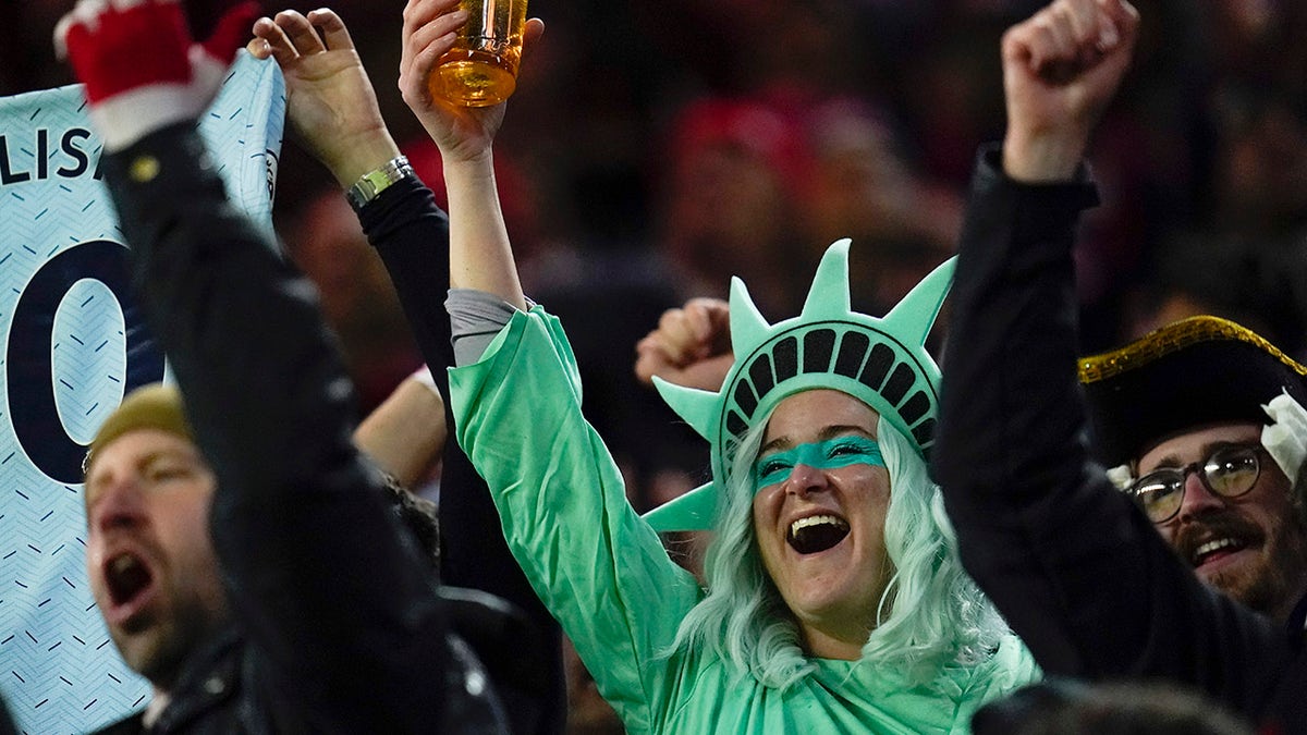 Fans react after United States' Christian Pulisic scored a goal against Mexico during the second half of a FIFA World Cup qualifying soccer match, Friday, Nov. 12, 2021, in Cincinnati. The U.S. won 2-0. 