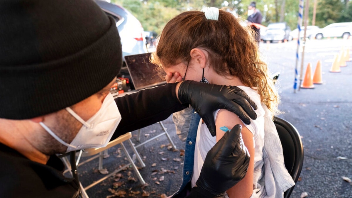 women getting covid vaccine
