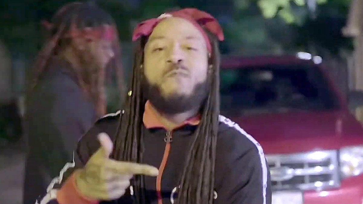 Screengrab from Brooks' "HALF A TIKKET" music video.