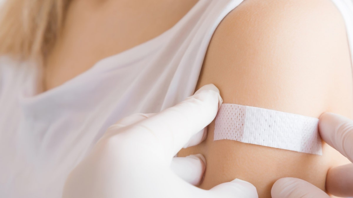 vaccine on woman's arm