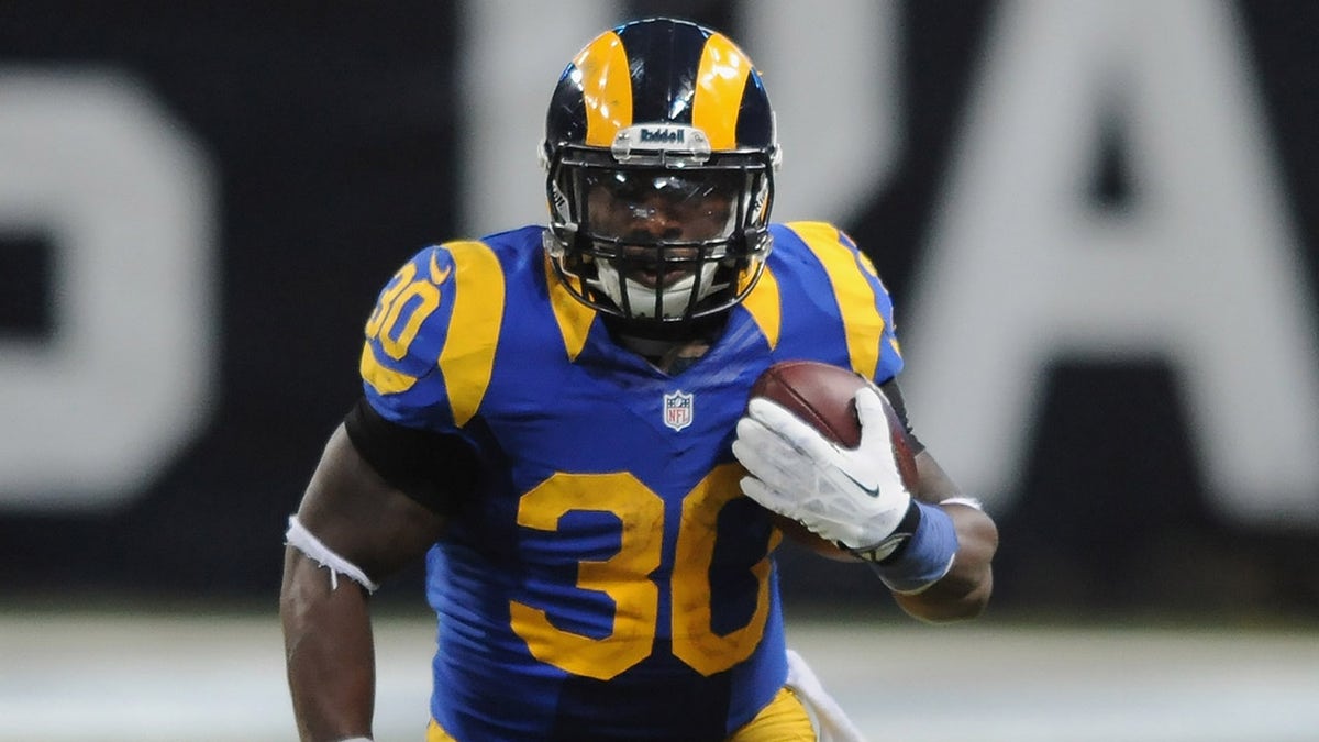 Zac Stacy of the St. Louis Rams runs during a game against the Tennessee Titans at the Edward Jones Dome on Nov. 3, 2013 in St. Louis, Missouri.