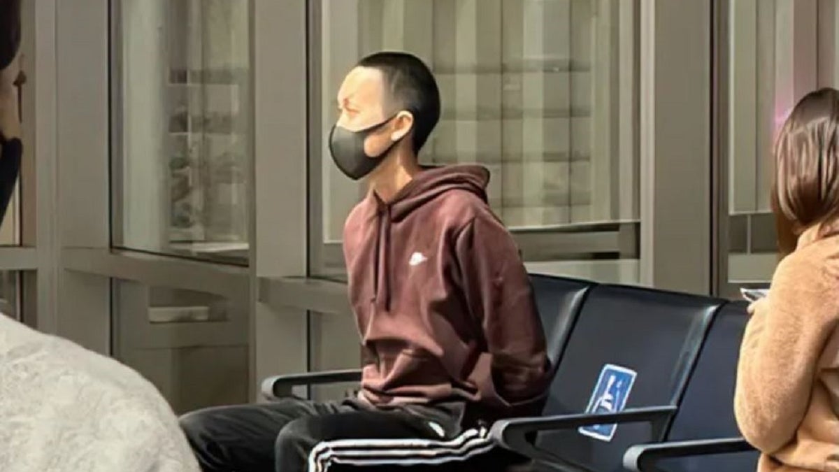 A man is detained after an alleged attack on an American Airlines flight attendant last week. A California man has been charged in the attack on an American Airlines flight crew member, the Justice Department said Monday. (@m6225r)