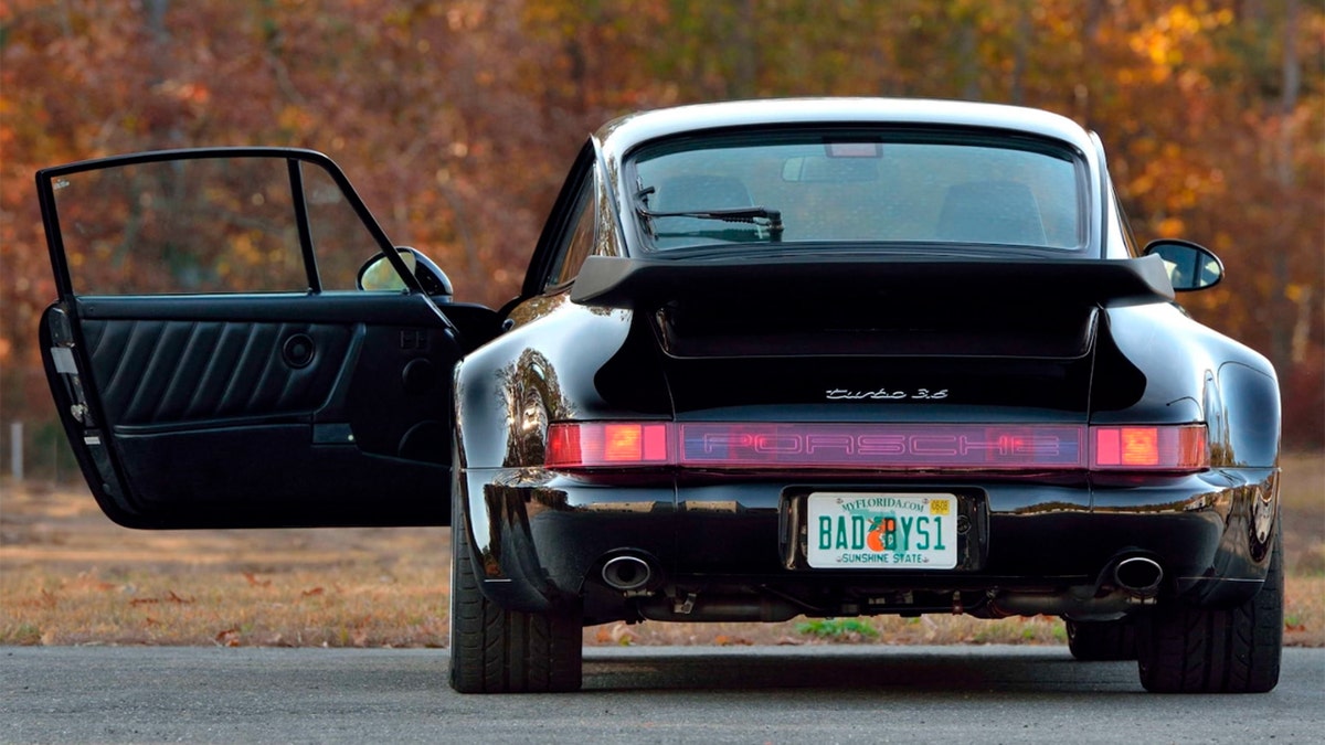 The 911 Turbo is currently registered in Florida with a BADBYS1 license plate.