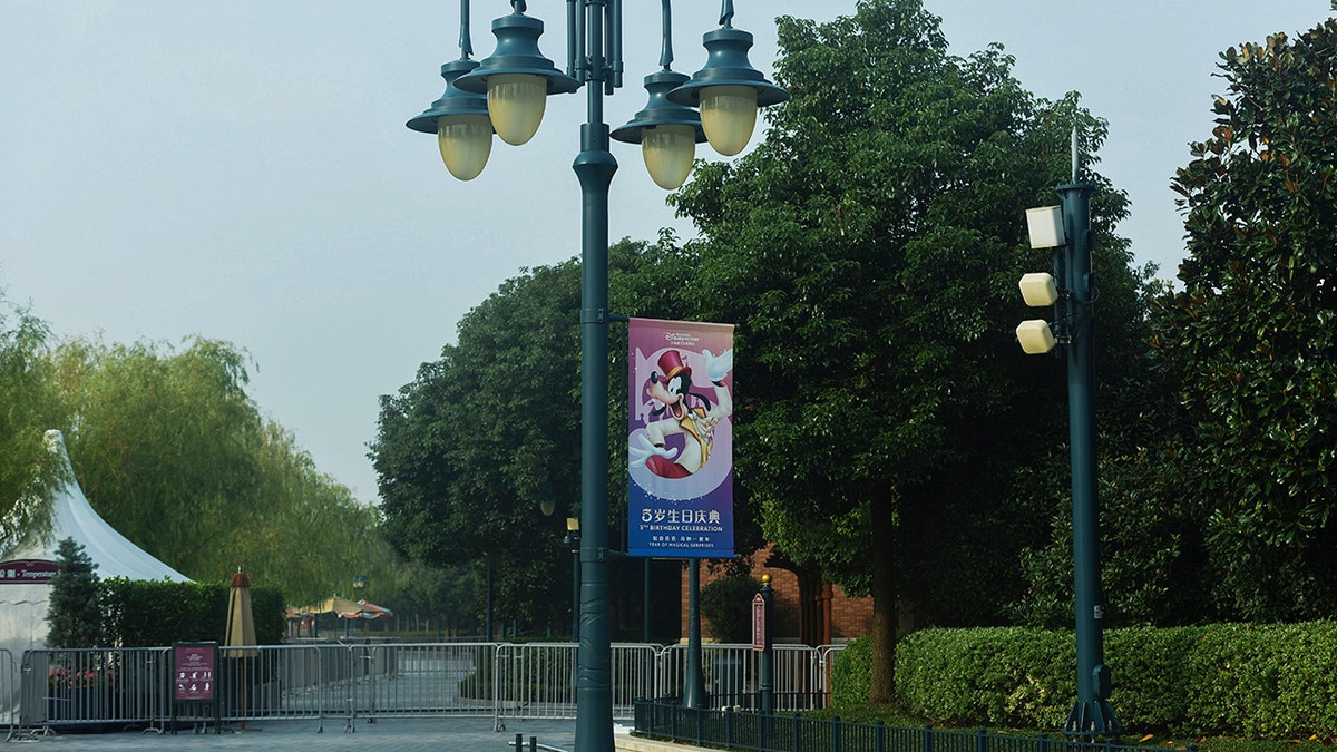 Barricades are set up at the closed Shanghai Disney Resort in Shanghai, China, on Monday.
