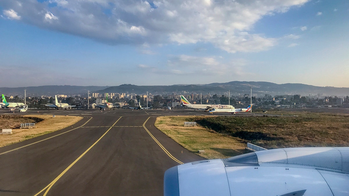 Planes sit on the tarmac at Bole International Airport in Addis Ababa, Ethiopia Wednesday, March 10, 2021. The United States Federal Aviation Administration warned pilots on Wednesday, Nov. 17, 2021, that planes operating at the airport could be "directly or indirectly exposed to ground weapons fire and/or surface-to-air fire," citing the "ongoing clashes" between Ethiopian forces and fighters from the northern Tigray region. 