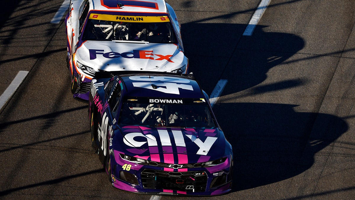 Alex Bowman and Denny Hamlin were fighting for the lead with seven laps to go.