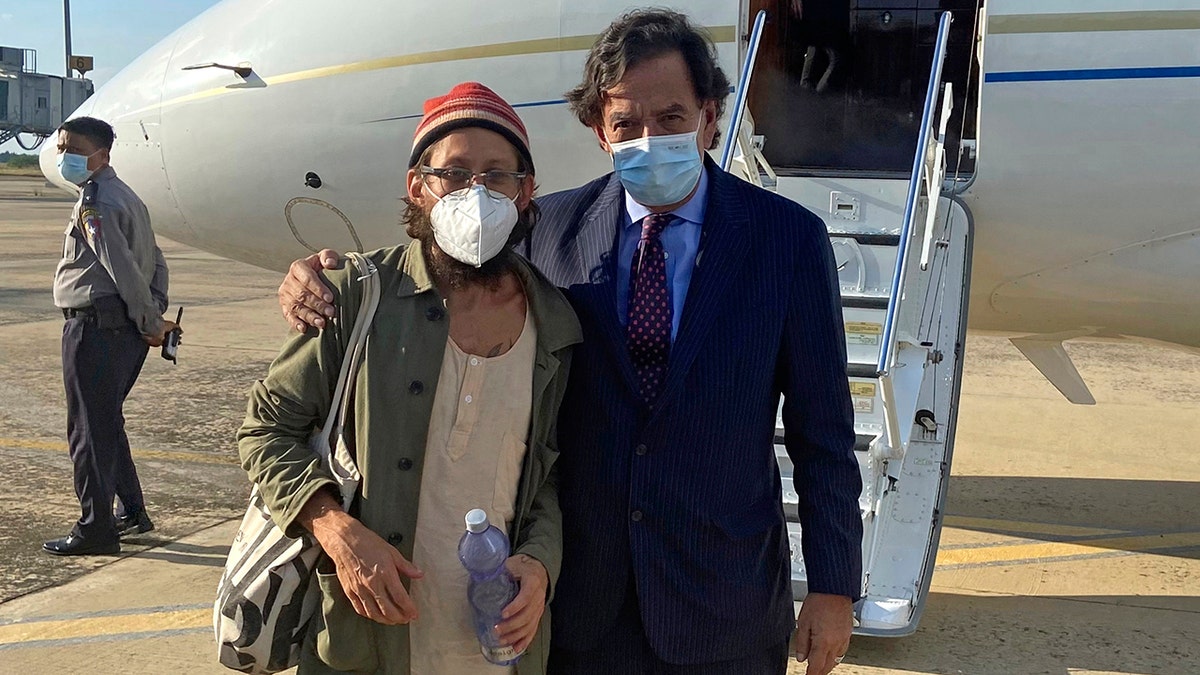Former U.S. Ambassador to the U.N. Bill Richardson poses with journalist Danny Fenster in Naypyitaw, Burma, Monday, Nov. 15, 2021. 